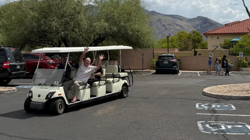 Church parking area with a golf cart