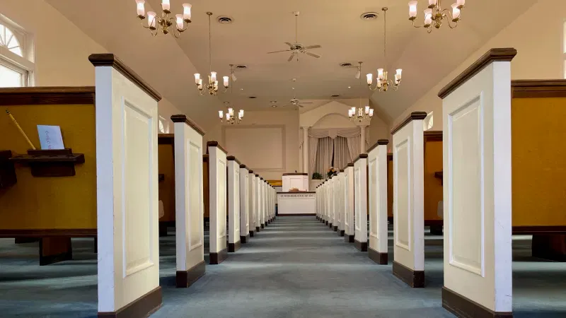 Church corridor with columns and windows